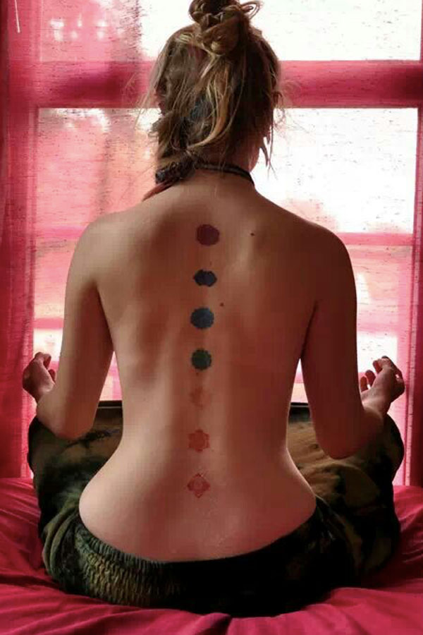 7 chakra back tattoo symbols spiritual in color  Round the World Magazine