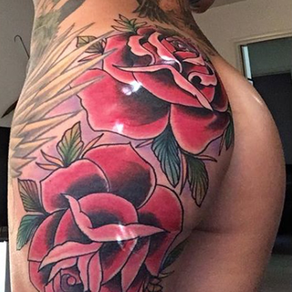 Flower Side Butt Tattoo by Thomas Sinnamond
