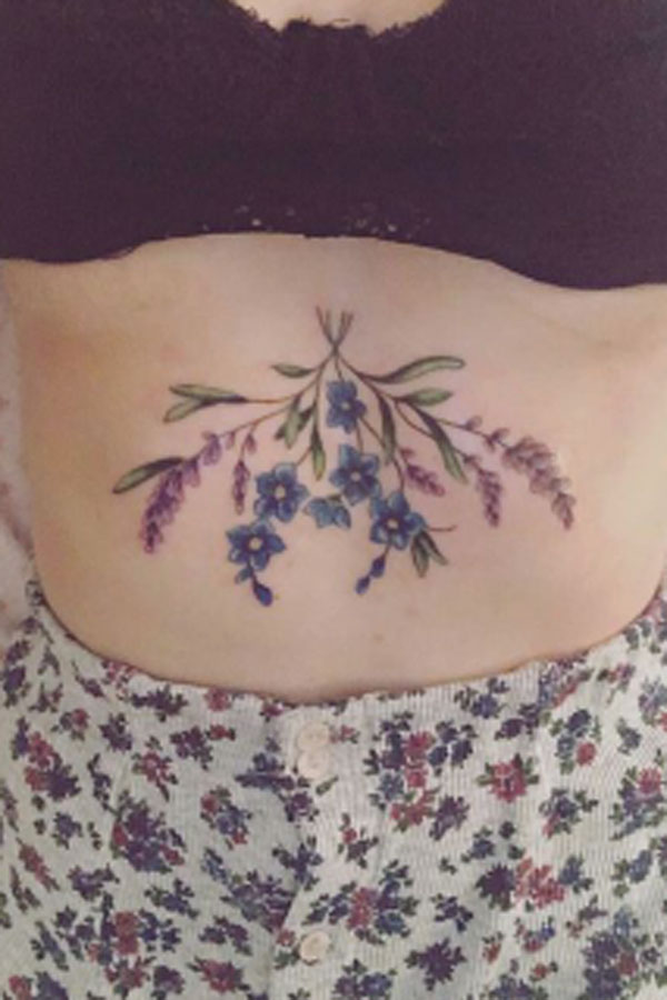 Floral triangle tattoo on the sternum  Tattoogridnet