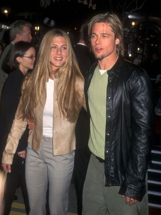 Brad Pitt et Jennifer Aniston se sont rencontrés en secret chez Georges Clooney