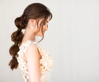 Le chignon bun, l'irrésistible classique pour votre coiffure de mariée