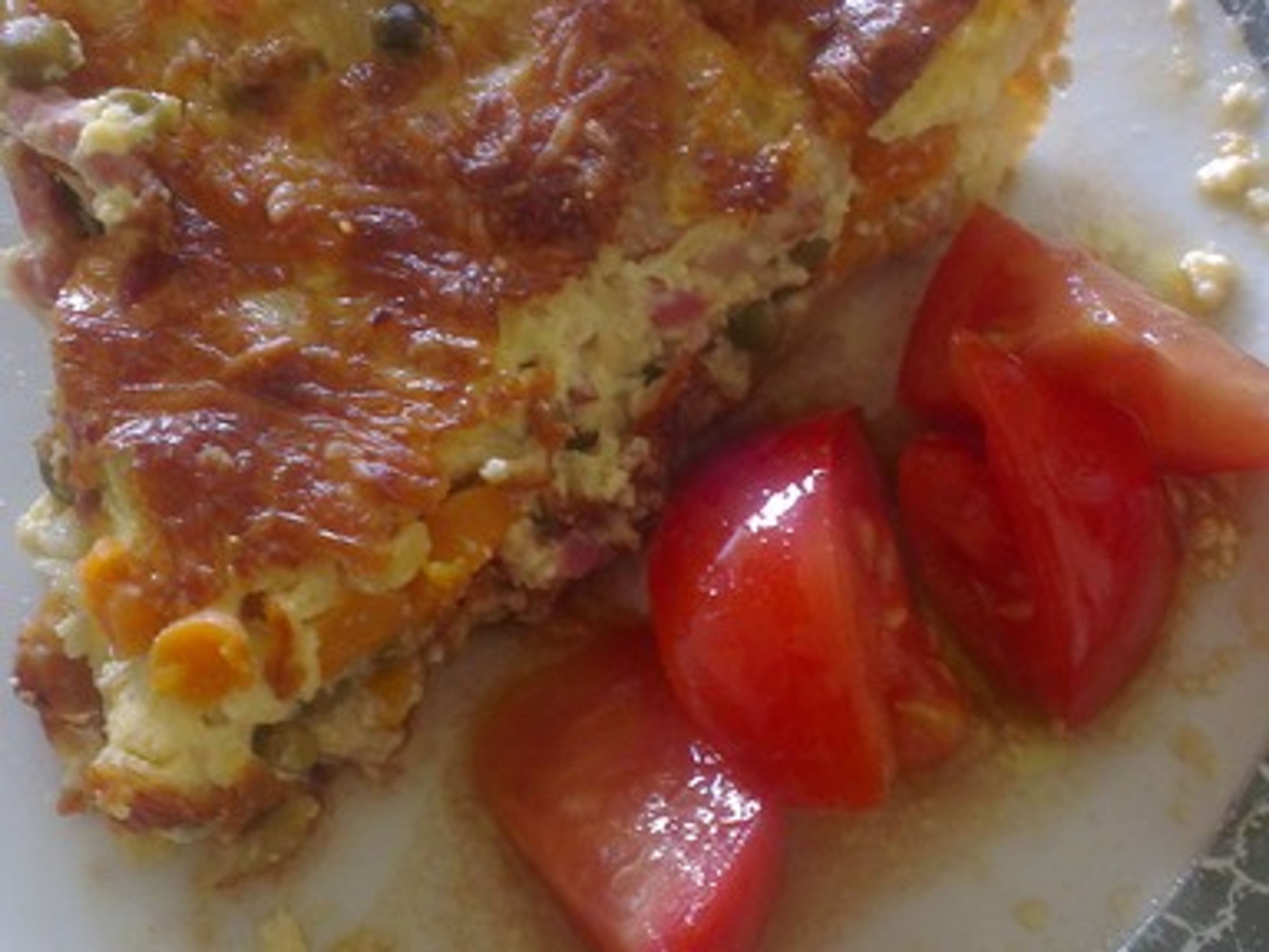 Quiche printanière aux petits pois, carottes, lardons et oignons