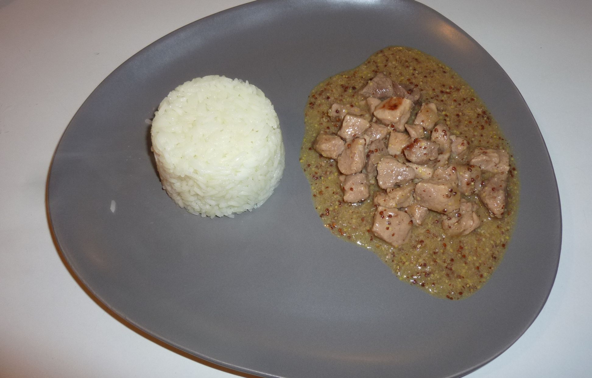Sauté de porc moutarde, bière et miel : Recette de Sauté de porc