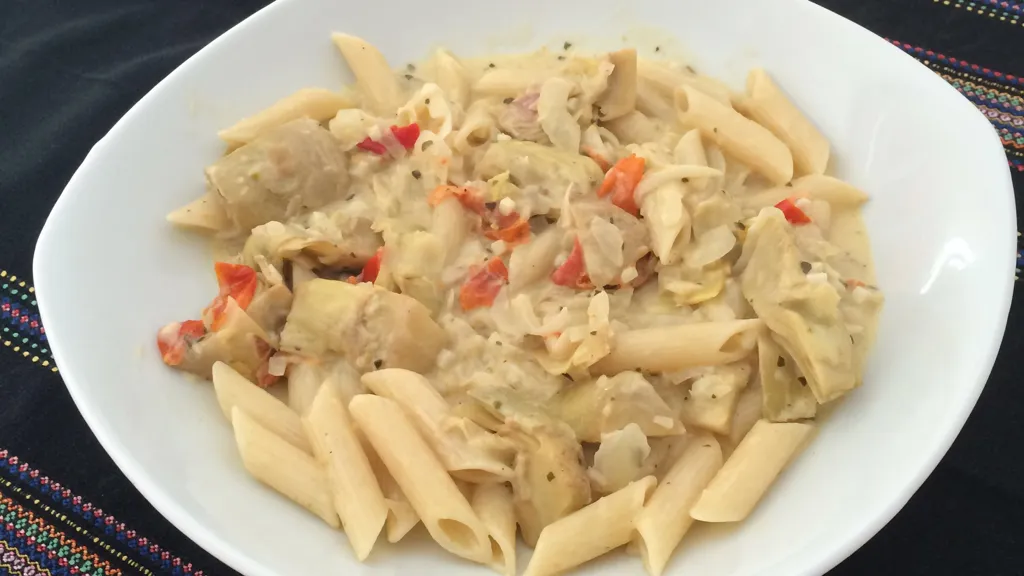 Penne au coeurs d'artichaut, pesto et basilic 