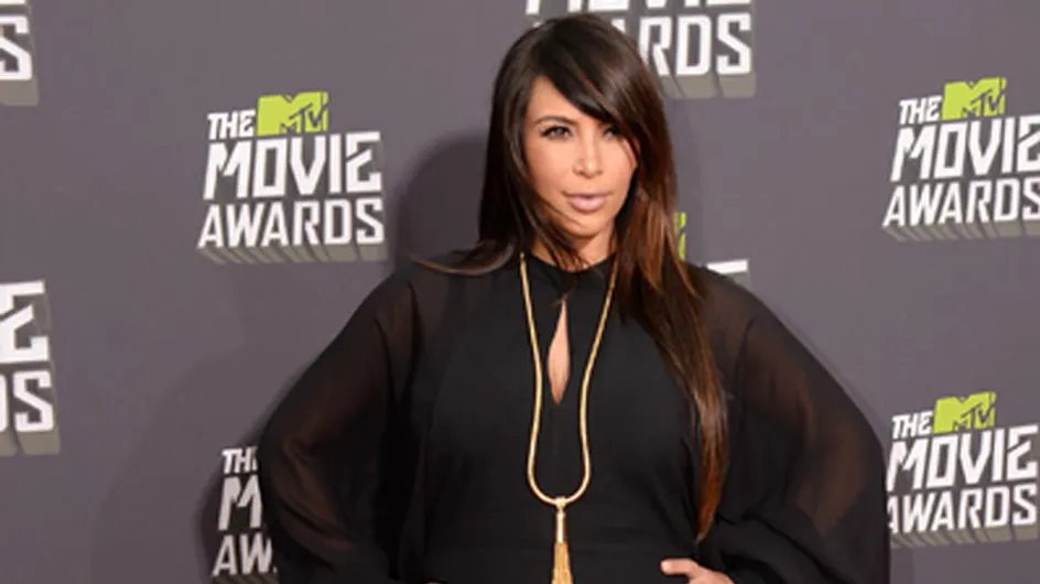 MTV Movie Awards 2013: Kim Kardashian covers up baby bump in tight black dress