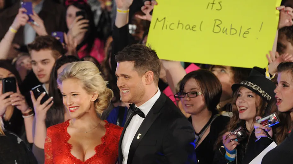Michael Bublé and pregnant wife Luisana Lopilato look red hot at JUNO Awards