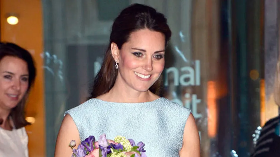 Pregnant Kate Middleton is defiant as "two people are charged" over topless photo scandal