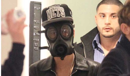Justin Bieber in a gas mask in London