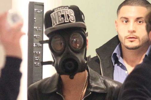 Justin Bieber in a gas mask in London