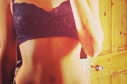 Millie Mackintosh shows off her abs