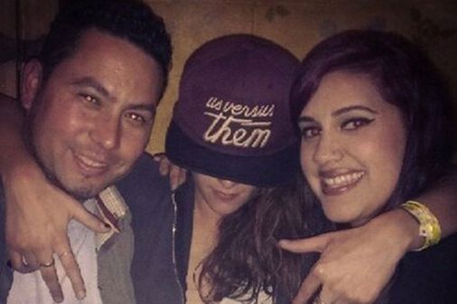 Kristen Stewart posing with fans