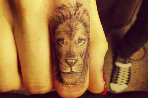 Cara Delevingne's lion tatto