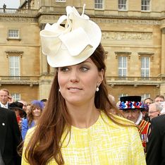 Pregnant Kate Middleton shows off her big baby bump at Buckingham Palace