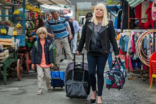 Sharon and Denis arrive back in the square
