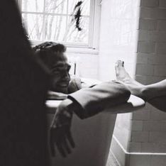 Robert Pattinson poses in bathtub for Dior campaign