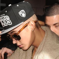 Justin Bieber denies spitting on fans as he's cleared of hit and run