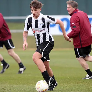 Louis Tomlinson sparks One Direction split rumours as he's signed by Doncaster Rovers