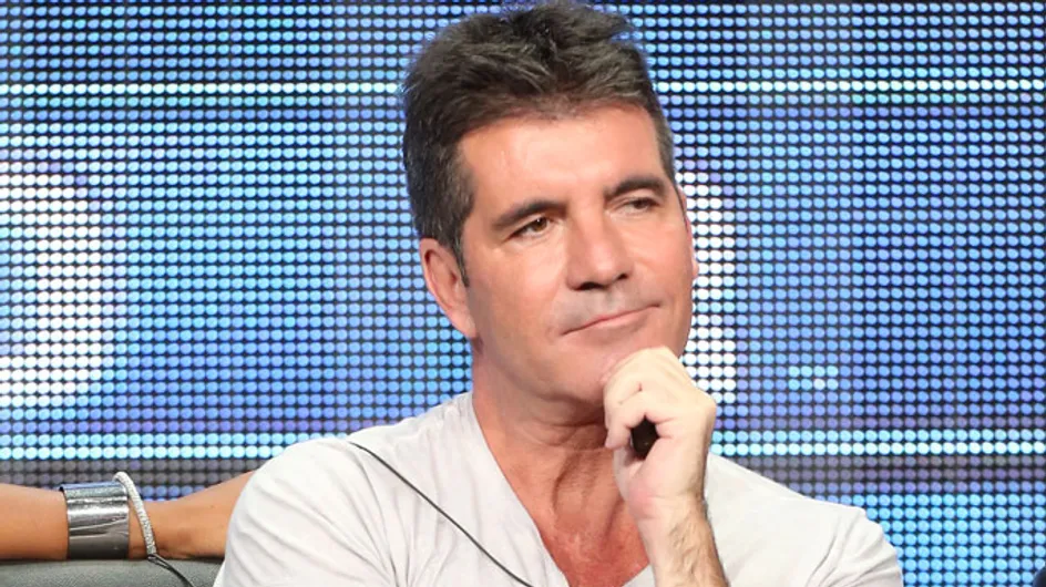 Simon Cowell brushes off baby rumours at One Direction concert