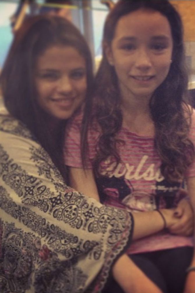 Selena Gomez with a fan
