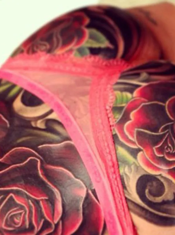 Cheryl Cole reveals huge rose tattoo extends all over her bum!