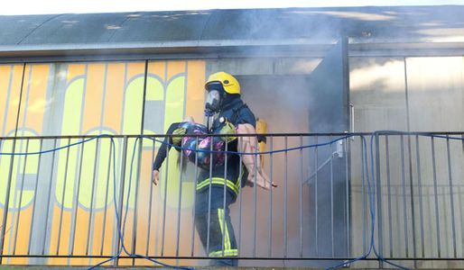 Fire fighters rescue Sinead from the flames