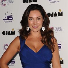 WATCH: Kelly Brook strips down to her underwear for risqué shoot