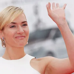 Too far with the Photoshop? Kate Winslet looks 'unnatural' and airbrushed on Vogue cover