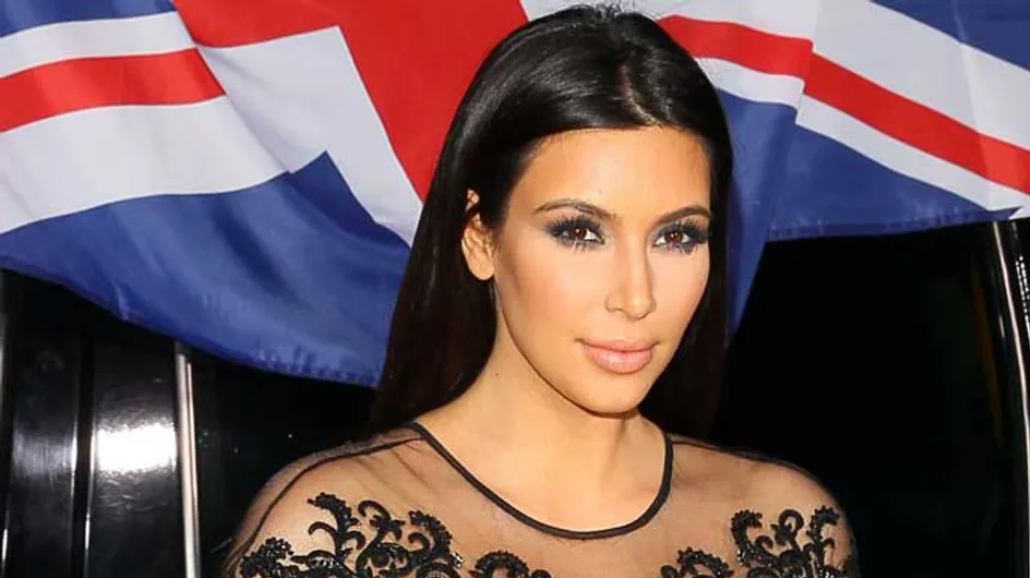 Kim Kardashian invites a fan to join her in the VIP section of Kanye West’s concert