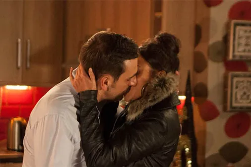 Peter and Tina passionately kiss