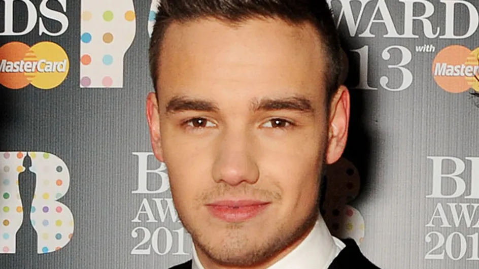 Liam Payne apologises after he is snapped on a high roof ledge
