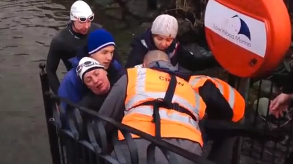 An exhausted Davina McCall is dragged out of lake during Sport Relief challenge