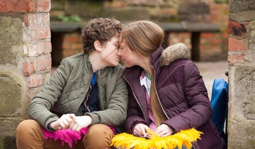 Peri and Tom kiss
