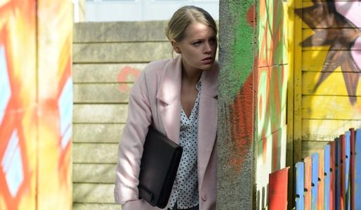 Lucy sees Lee and Whitney kissing