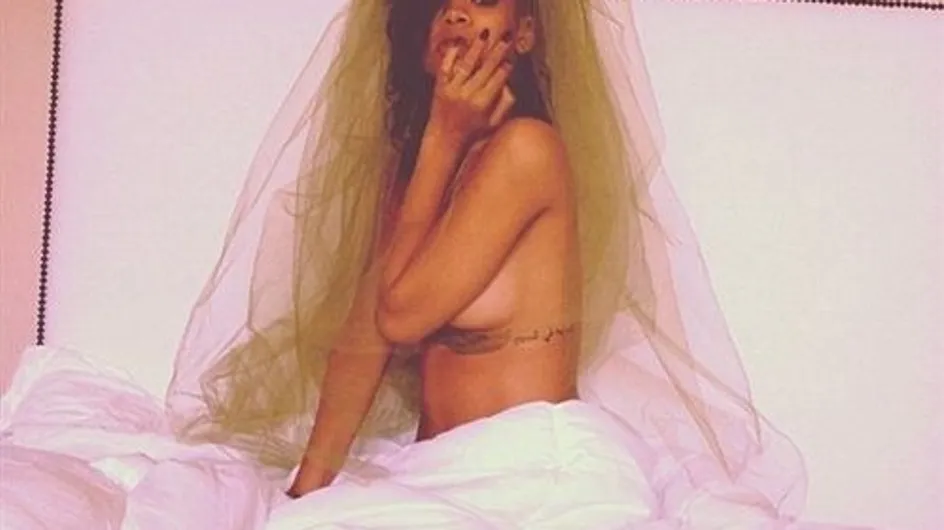 Rihanna posa en topless y vestida de novia