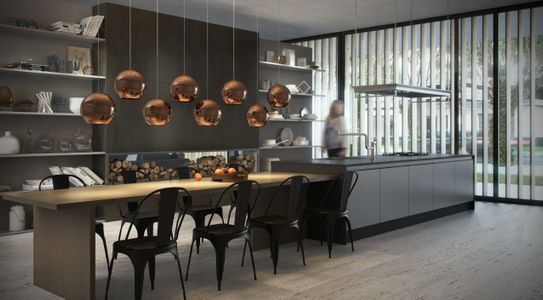 Com pegada moderna, as luminárias fazem a diferença na decoração da cozinha americana