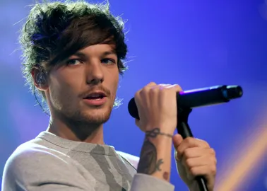 Louis Tomlinson is 'surprised but happy' at baby news, wants to be a 'hands  on dad