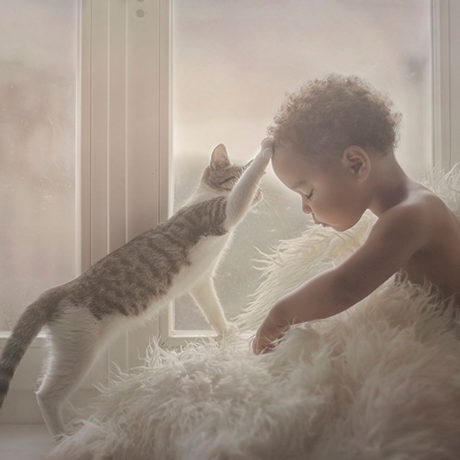 Les plus belles photos d'enfants avec des animaux