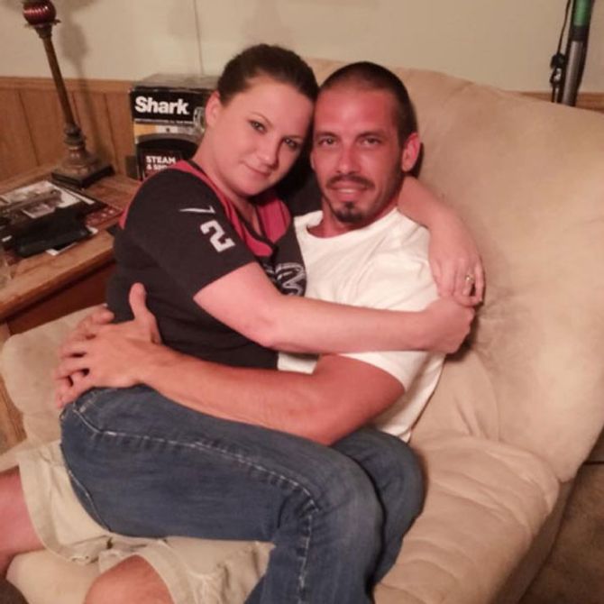 'My baby!' Jennifer Mulford breastfeeds her 36-year-old boyfriend Brad Lesson