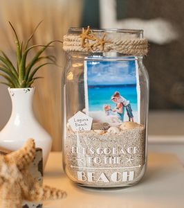 Fotos in Glas mit Sand