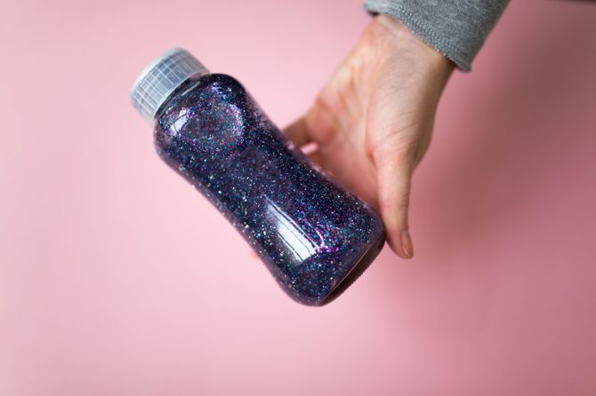 The sensory bottle with glitter 