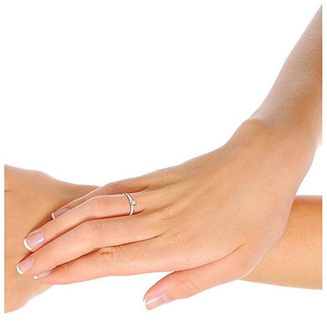 Solitario de oro blanco con incrustación de diamanete de Orovi