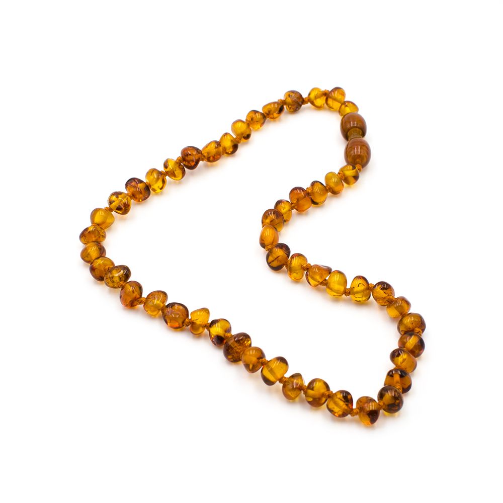 Un collier d'ambre pour soulager la poussée dentaire de bébé ?