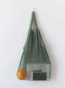 Le sac filet de pêche : comment porter ce it-bag de l'été