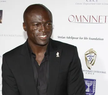 Omar Sy, rare sortie avec sa fille au défilé Louis Vuitton, face à