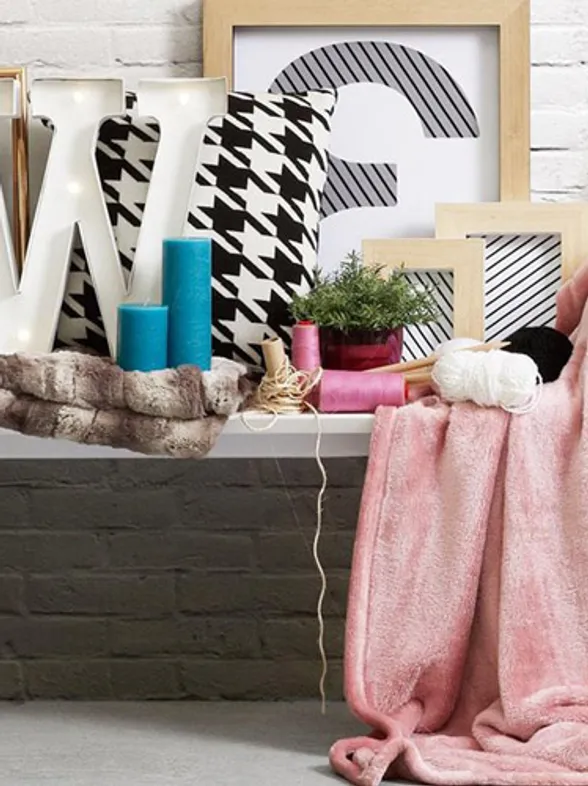 ¿Qué es el plaid? Descubre por qué una sencilla manta se ha convertido en un must en decoración