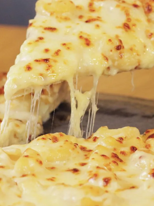 This UK Pizza Chain Is Selling A Mac And Cheese Stuffed Crust & We're Not Worthy