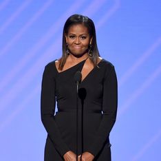 Michelle Obama, un retour remarqué dans une robe noire moulante très chic (Photos)