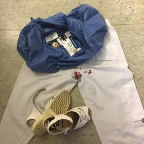 Midwife Shares Photo Of Period Blood-stained Uniform After She Was Too Busy To Change