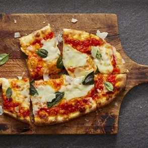 Cómo conseguir bases de pizza propias de la mismísima Italia