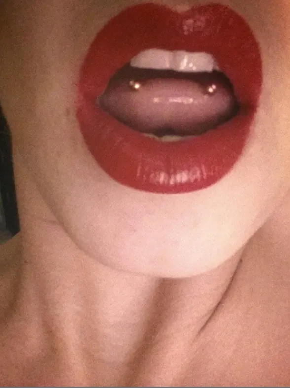 People Are Getting Their Tongue Tips Pierced To Mimic Snake Eyes